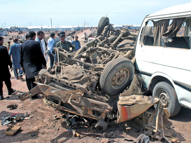 damaged vehicles at the site of the car bomb attack at jalozai camp photo express damaged vehicles at the site of the car bomb attack at jalozai camp photo express