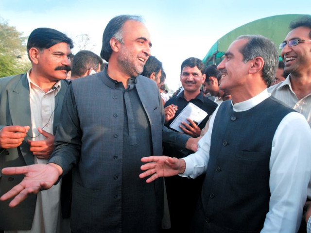 qamar zaman kaira and khawja saad rafique share a light moment after the committee meeting on friday photo inp qamar zaman kaira and khawja saad rafique share a light moment after the committee meeting on friday photo inp
