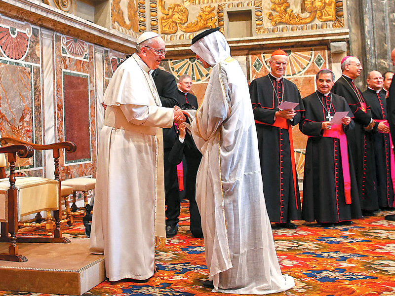 pope francis greets a diplomat during an audience with the diplomatic corps at the vatican photo afp