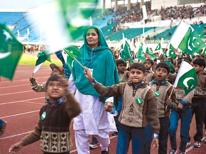 children marching in a parade to celebrate pakistan day photo muhammad javaid myra iqbal express