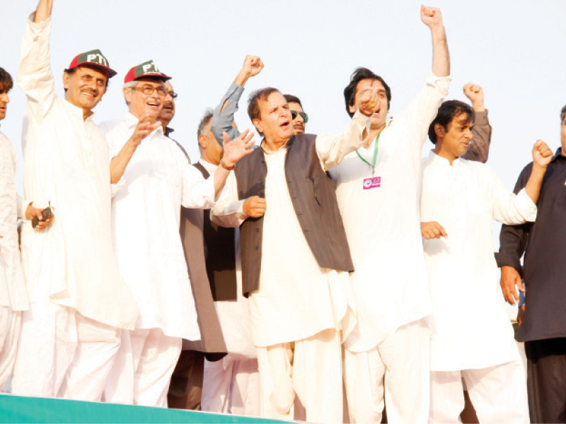 pti central president javed hashmi and others gesture during the pti rally at minar i pakistan photo abid nawaz shafiq malik express