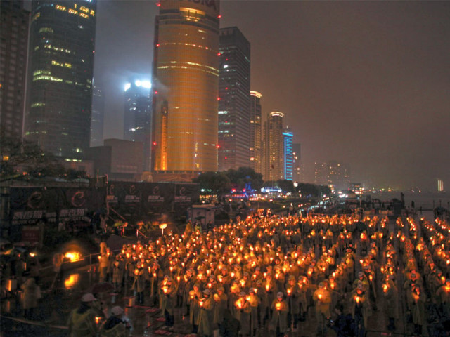 people hold candles during an event attempting to establish a guinness world of record for blowing out the most number of candles simultaneously during earth hour in shanghai photo reuters people hold candles during an event attempting to establish a guinness world of record for blowing out the most number of candles simultaneously during earth hour in shanghai photo reuters
