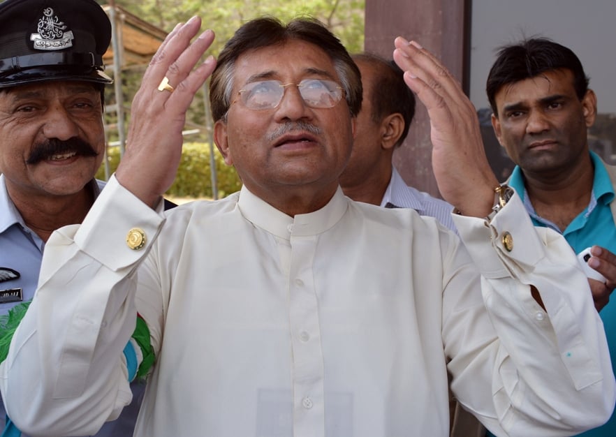 pervez musharraf prays after he arrived at the karachi international airport from dubai in karachi on march 24 2013 photo afp