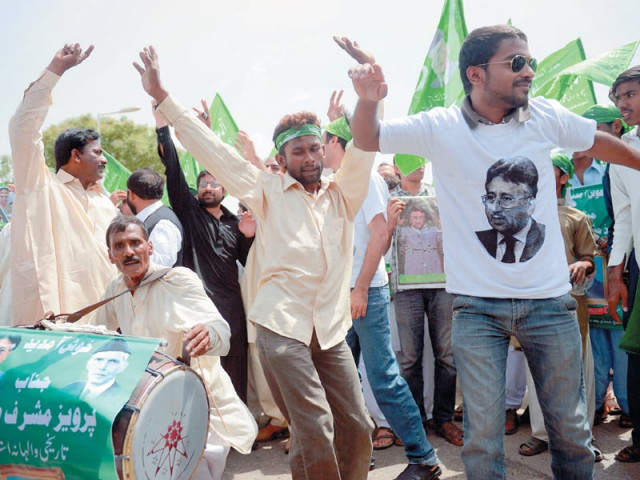 men dance outside the airport on sunday as they wait for former president pervez musharraf s flight to arrive hundreds turned up outside the airport even though the tehreek e taliban pakistan said that it had formed a team to assassinate him photo afp