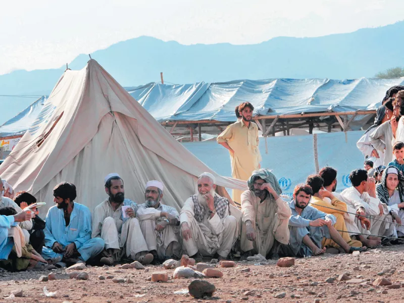 idps wait for eid packages to be distributed by the unhcr in this picture dated september 17 2009 on march 22 the unhcr postponed the registration of idps from tirah valley at jalozai camp photo file idps wait for eid packages to be distributed by the unhcr in this picture dated september 17 2009 on march 22 the unhcr postponed the registration of idps from tirah valley at jalozai camp photo file