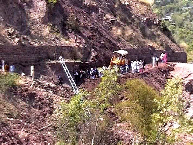 a view of a highway blocked due to landslide on shahra e kashmir photo file