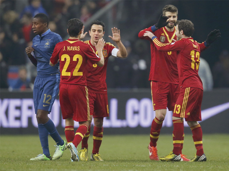 spain reclaim their top position in their 2014 world cup qualifying group on tuesday as they beat former leaders france 1 0 in a hard fought clash photo afp