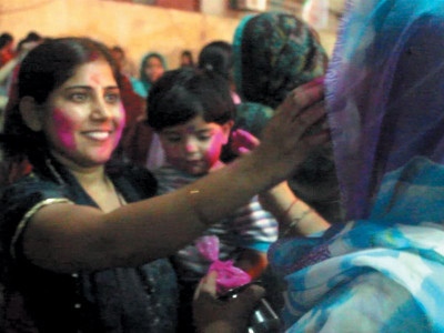 soaked in mirth and colour hindu community celebrates holi