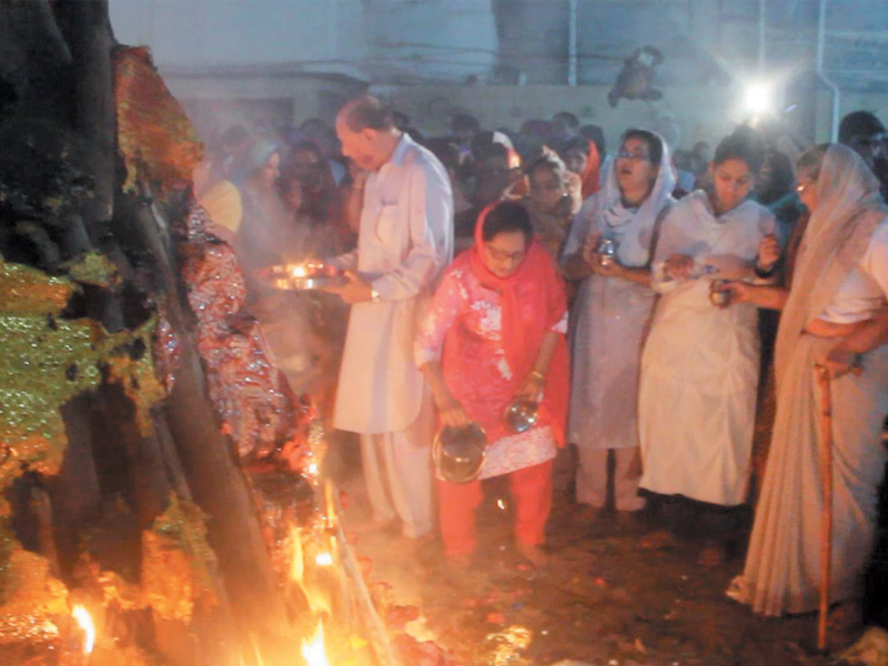 people gathered at the swami narayan mandir in karachi for the holika dahan   a bonfire that marks the triumph of good over evil photo express