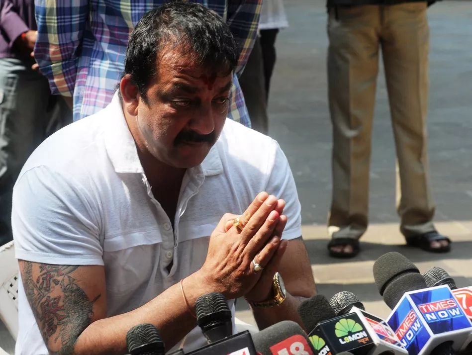 sanjay dutt gestures during a media conference outside his residence in mumbai on march 28 2013 p sanjay dutt gestures during a media conference outside his residence in mumbai on march 28 2013 p