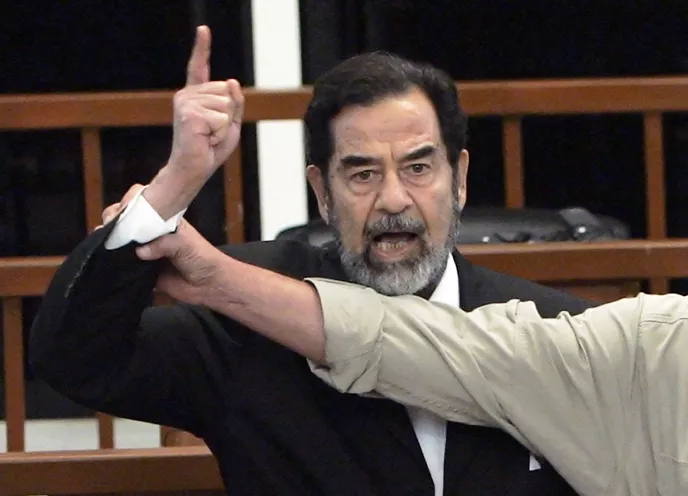 a november 5 2006 file photo of former iraqi president saddam hussein shouting at the court as a bailiff attempts to silence him during the delivery of his verdict in his trial photo afp a november 5 2006 file photo of former iraqi president saddam hussein shouting at the court as a bailiff attempts to silence him during the delivery of his verdict in his trial photo afp