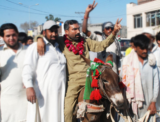 to protest the party decision iqbal anjum rode the donkey for two kilometers to submit his nominations for pp 97 as an independent candidate photo express to protest the party decision iqbal anjum rode the donkey for two kilometers to submit his nominations for pp 97 as an independent candidate photo express