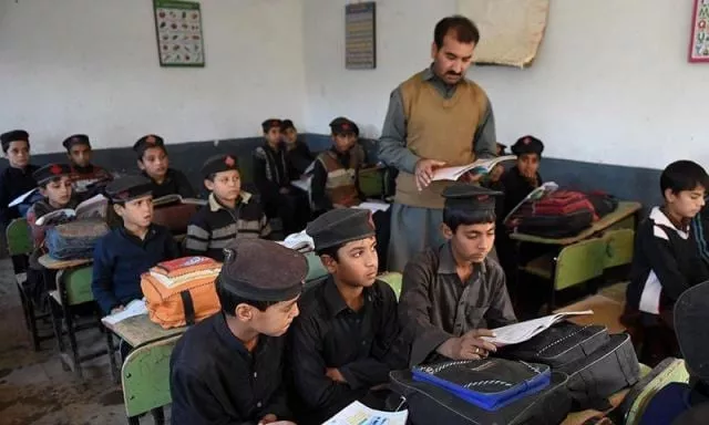 school children attend a class at a school in peshawar photo afp school children attend a class at a school in peshawar photo afp
