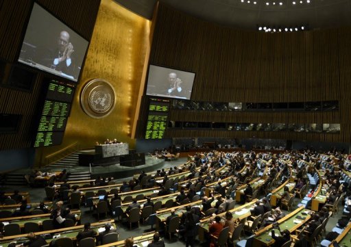 delegates to the united nations general assembly applaud the passage of the treaty on april 2 2013 photo afp