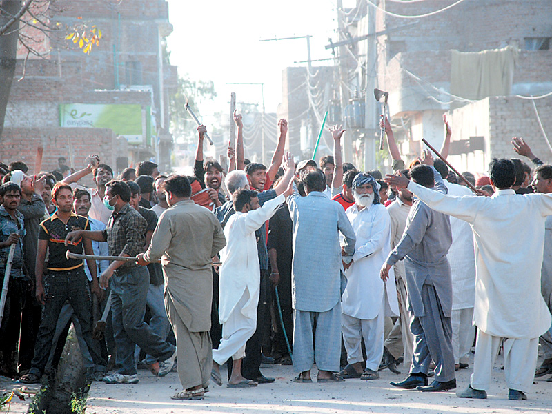 dozens of angry men took to the streets of gujranwala after a minor argument turned into a clash photo express