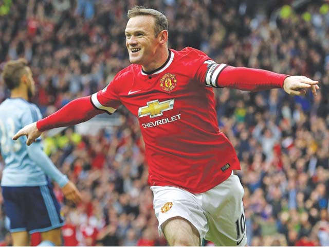 manchester united striker wayne rooney celebrates his opening goal against west ham united at old trafford he was later sent off a for a lunging tackle photo afp