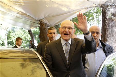 lebanese former minister tammam salam gestures to his supporters in front of his house while going to the presidential palace in baabda beirut april 6 2013 photo reuters