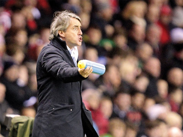 with united 15 points clear of second placed city mancini has been forced to concede his side s reign as champions is all but over photo afp with united 15 points clear of second placed city mancini has been forced to concede his side s reign as champions is all but over photo afp