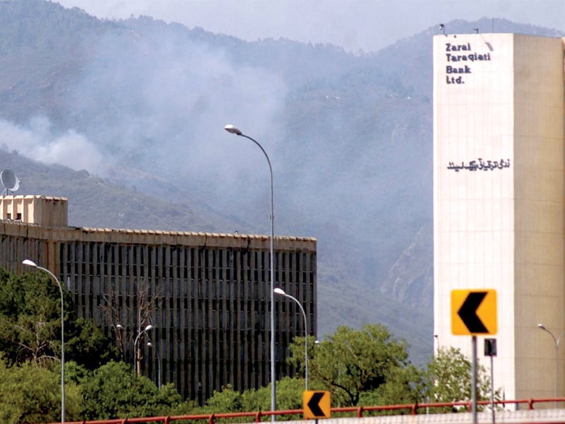 one stone crusher has installed a dust suppression system to settle the dust generated during the crushing process on margalla hills photo inp