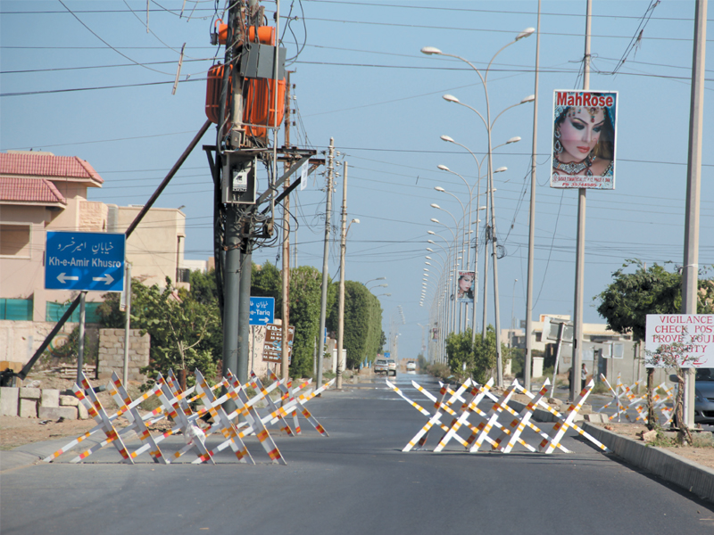 barriers set up along khayaban e amir khasrau in dha photo ayesha mir express