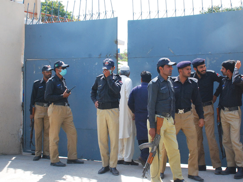 police deployed in front of the gepco office to stop protesters from attacking photo khurram shehzad express