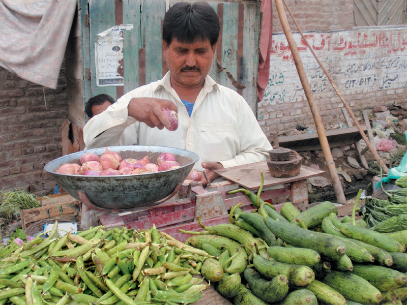 ali gohar shaikh the vegetable vendor is to try his luck as a poll candidate photo express