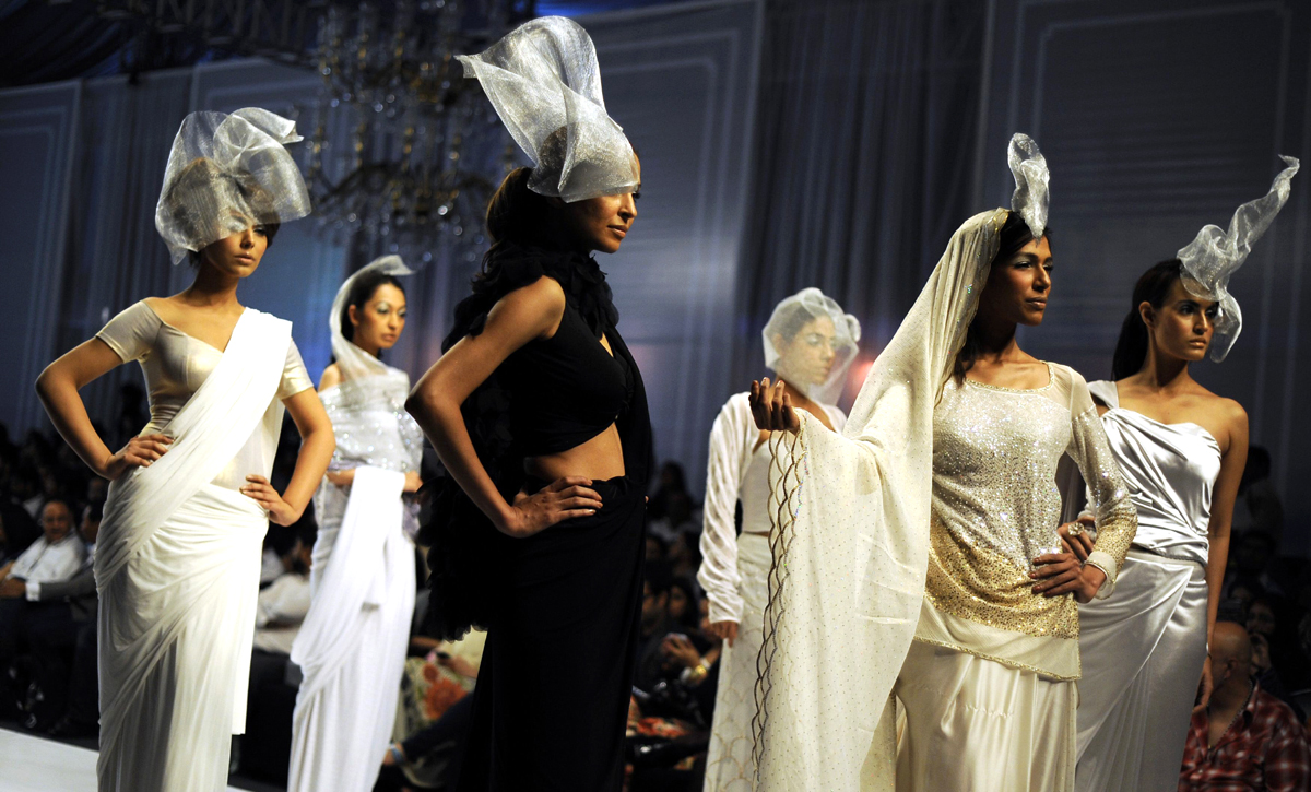 models present creations by the house of maheen on the first day of fashion pakistan week in karachi april 9 2013 photo reuters