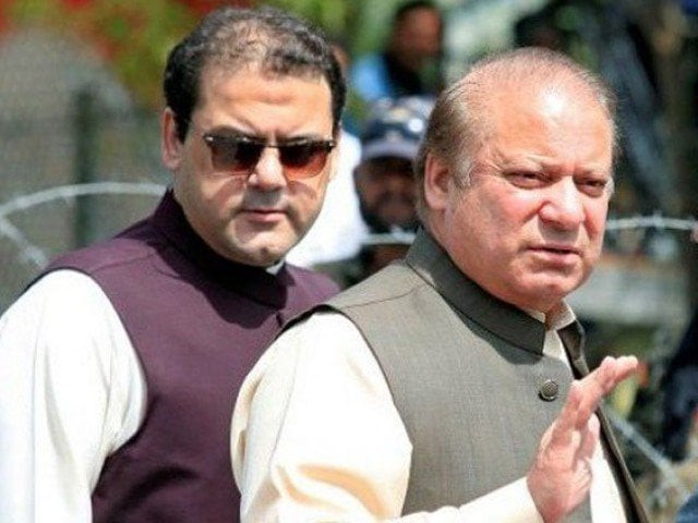 hussain nawaz with pm nawaz sharif photo reuters