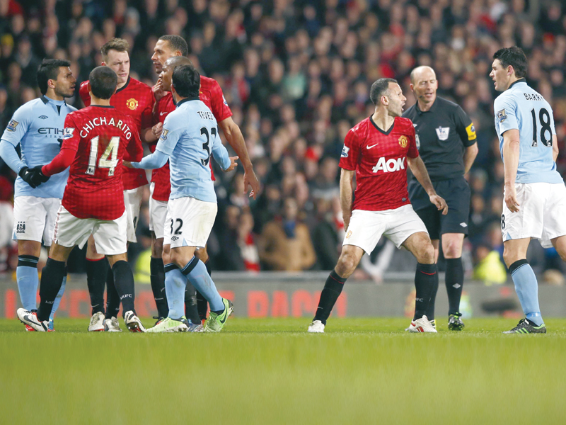 tempers frayed towards the end when united failed to put the ball out of play when david silva was down with a hamstring injury photo reuters