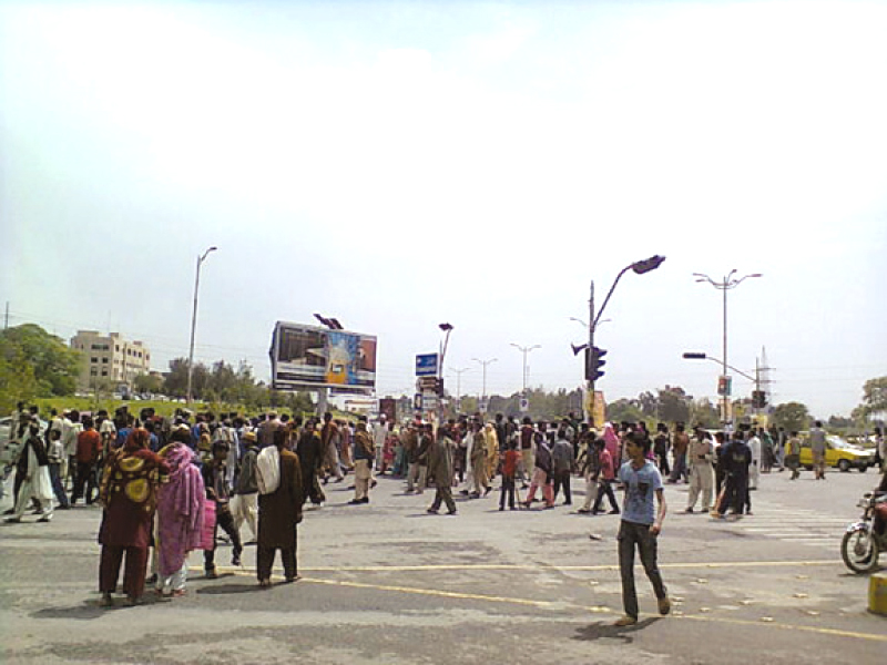 following the operation around 150 members of the affected families gathered at peshwar mor and blocked the main intersection for all kind of traffic photo the express