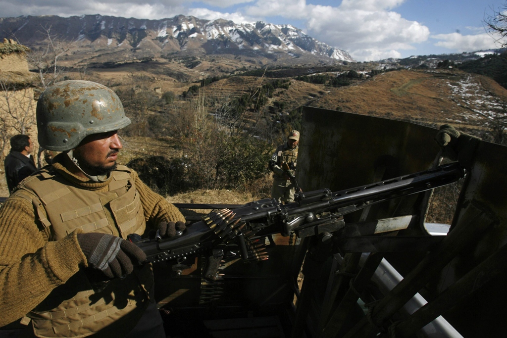 a pakistani army soldier stands guard during a patrol in pakka village in kurram tribal agency december 18 2012 photo reuters