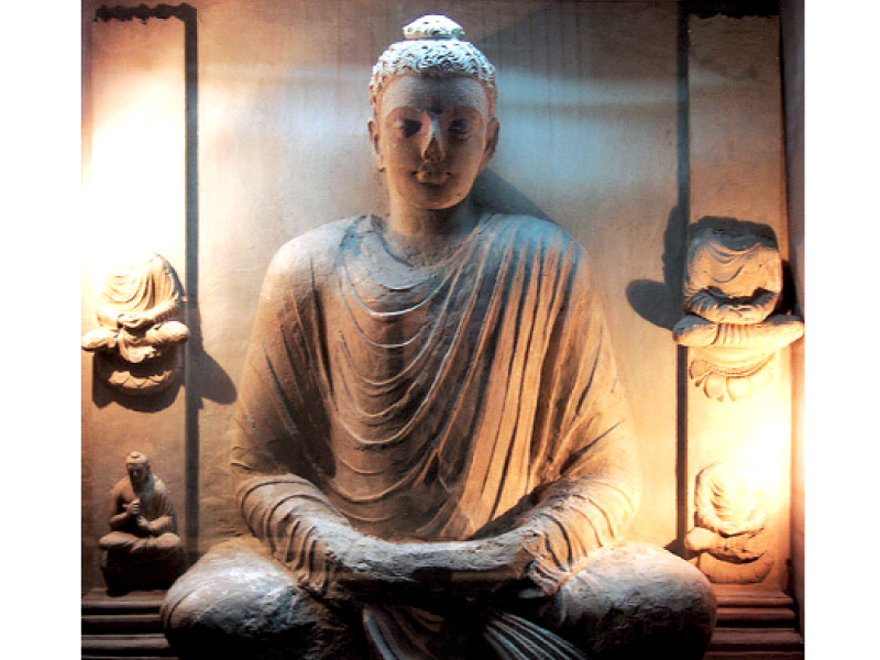 statue of buddha at taxila museum left photo waqas naeem file