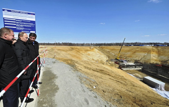 russian president vladimir putin 2l and vladimir popovkin r head of the federal space agency inspect the construction of launch site of the rocket at the vostochny cosmodrome on april 12 2013 photo reuters russian president vladimir putin 2l and vladimir popovkin r head of the federal space agency inspect the construction of launch site of the rocket at the vostochny cosmodrome on april 12 2013 photo reuters