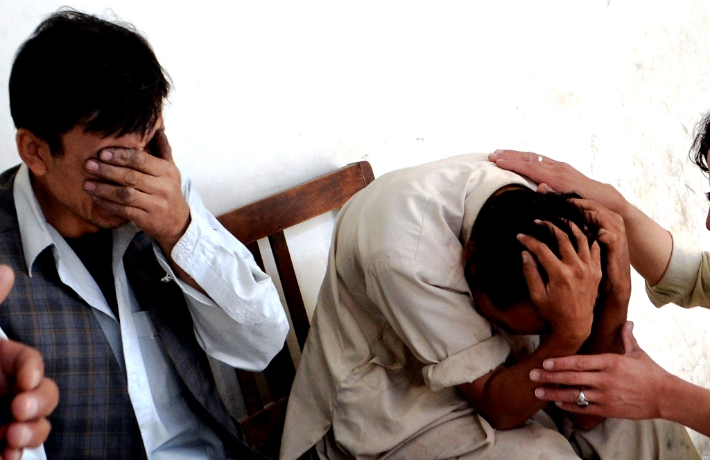 a file photo of mourning members of the hazara community photo afp file
