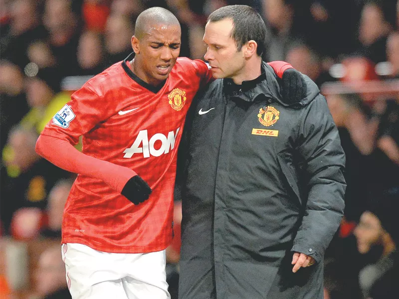 ashley young has been sidelined for two weeks following an ankle injury during monday s defeat against manchester city photo afp ashley young has been sidelined for two weeks following an ankle injury during monday s defeat against manchester city photo afp