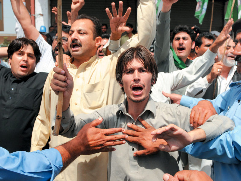 supporters of pervez musharraf protest outside the court in islamabad photo afp