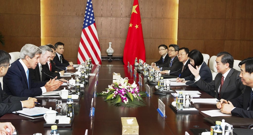 us secretary of state john kerry l talks with chinese foreign minister wang yi not pictured during their meeting in beijing on april 13 2013 photo afp