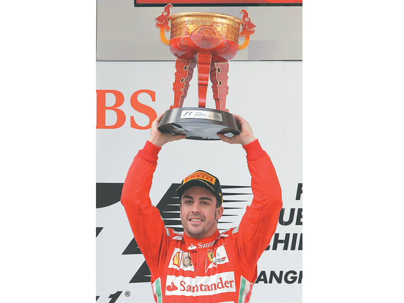 with the win in shanghai third placed alonso is now just nine points behind red bull s vettel in the drivers championship table photo reuters