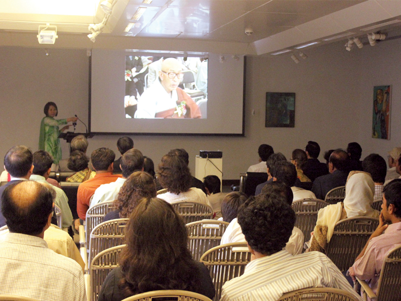 a small gathering engrossed in a documentary about monk maranantha s historical journey from china to south korea at national art gallery on sunday photo waqas naeem express