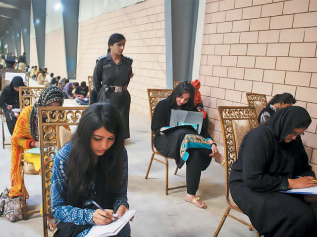 candidates at the entry test for recruitment in the police department at the expo centre on sunday the sindh police has raised the women employment quota into the police up to five per cent photo online candidates at the entry test for recruitment in the police department at the expo centre on sunday the sindh police has raised the women employment quota into the police up to five per cent photo online