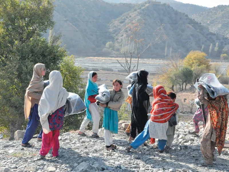 girls carry blankets distributed by the local army officers in south waziristan majority of the agency s tribesmen remain displaced since the military operations commenced in 2009 photo tahir khan express girls carry blankets distributed by the local army officers in south waziristan majority of the agency s tribesmen remain displaced since the military operations commenced in 2009 photo tahir khan express