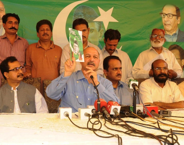 pml q general secretary mushahid hussain syed holds his party 039 s election manifesto photo rashid ajmeri express pml q general secretary mushahid hussain syed holds his party 039 s election manifesto photo rashid ajmeri express