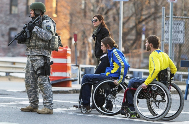 a metro swat officer stands guard on massachusetts avenue near the scene of multiple bombings near the finish line of the boston marathon in boston photo reuters a metro swat officer stands guard on massachusetts avenue near the scene of multiple bombings near the finish line of the boston marathon in boston photo reuters