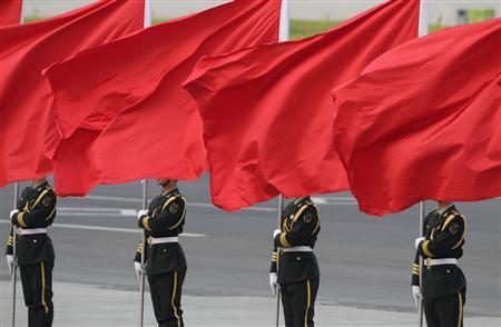 members of the people 039 s liberation army guard of honour stand with red flags during an official welcome ceremony outside the great hall of the people in beijing april 15 2013 photo reuters