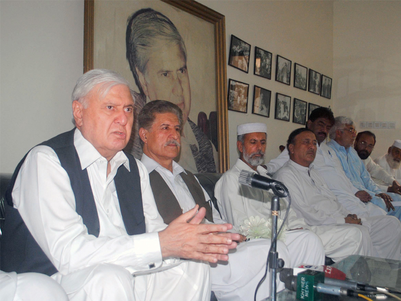 qaumi watan party chairman aftab ahmad khan sherpao speaking at a press conference at the party s secretariat in hayatabad photo muhammad iqbal express