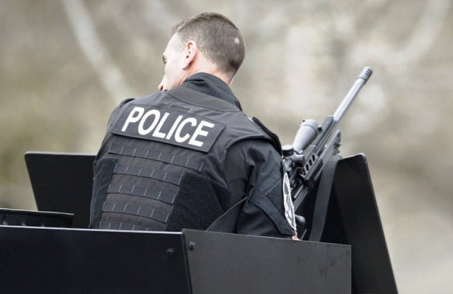 a police sniper mans his rifle atop an armored personnel carrier during a police assault on a house on franklin street during the search for dzhokhar tsarnaev the surviving suspect in the boston marathon bombings in watertown massachusetts april 19 2013 photo reuters a police sniper mans his rifle atop an armored personnel carrier during a police assault on a house on franklin street during the search for dzhokhar tsarnaev the surviving suspect in the boston marathon bombings in watertown massachusetts april 19 2013 photo reuters