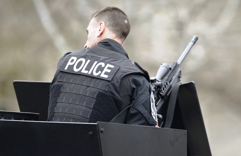 a police sniper mans his rifle atop an armored personnel carrier during a police assault on a house on franklin street during the search for dzhokhar tsarnaev the surviving suspect in the boston marathon bombings in watertown massachusetts april 19 2013 photo reuters