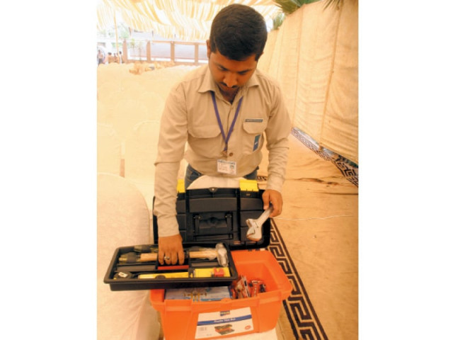 waqas pervaiz who was awarded the best of the batch certificate examines the tool kit he received as a prize during the 2nd graduation ceremony of hunar foundation at its dms technical institute on saturday photo athar khan express waqas pervaiz who was awarded the best of the batch certificate examines the tool kit he received as a prize during the 2nd graduation ceremony of hunar foundation at its dms technical institute on saturday photo athar khan express