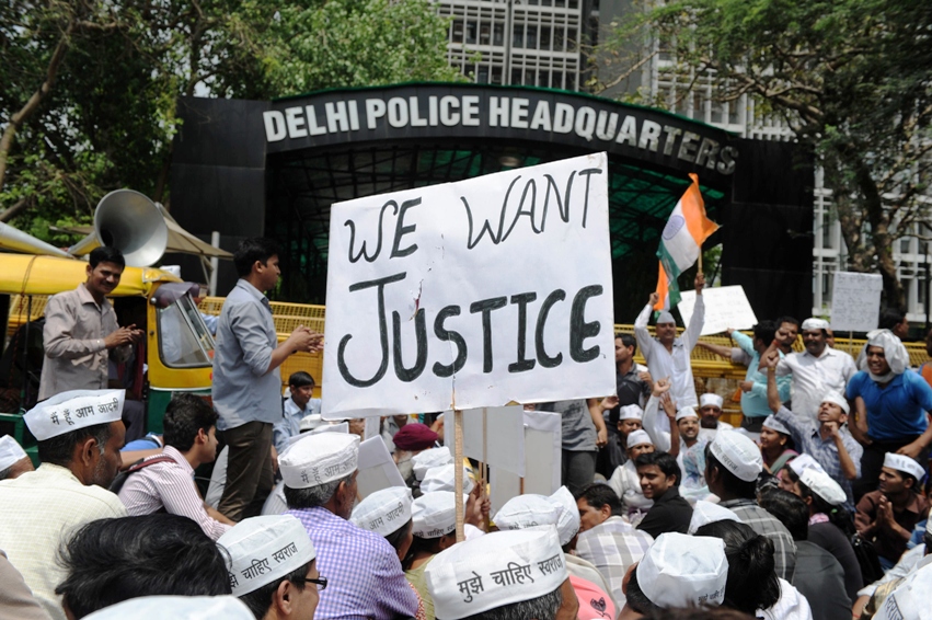 protesters shout anti government slogans during a demonstration against the rape of a five year old girl in front of police headquarters in new delhi on april 21 2013 photo afp