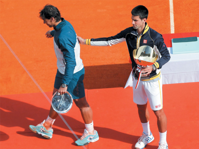 djokovic became the first player to defeat nadal in three different finals on clay yesterday photo reuters djokovic became the first player to defeat nadal in three different finals on clay yesterday photo reuters